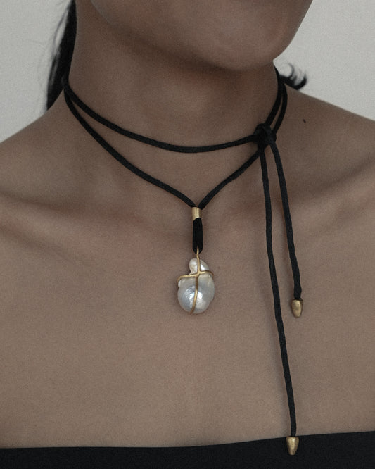 Drop pearl pendant by Zeme Studio